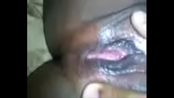 Ebony babe plays with her wet pussy